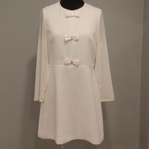 White knee length dress
